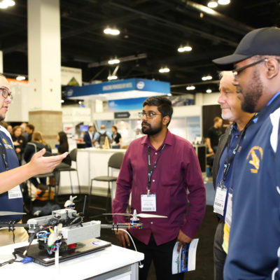 Sechan employees at trade show