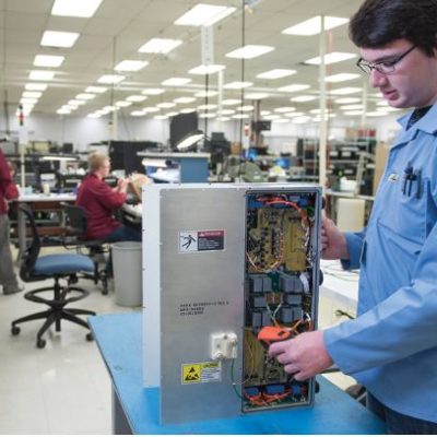 Worker working on electronic device