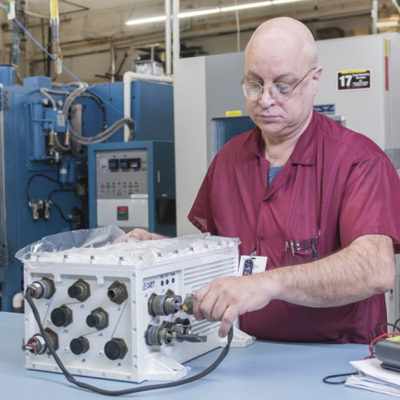 Worker working on electronic device
