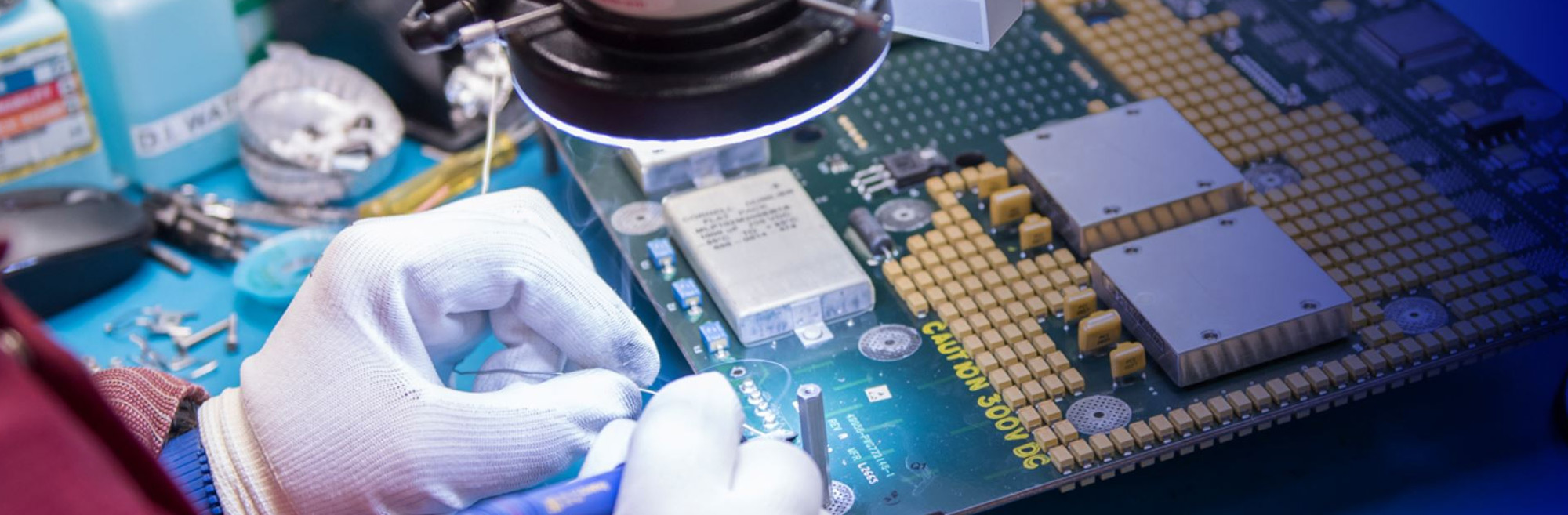 Worker working on electronic device
