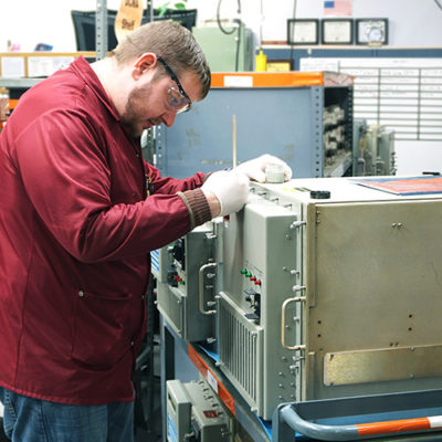 Worker working on electronic device
