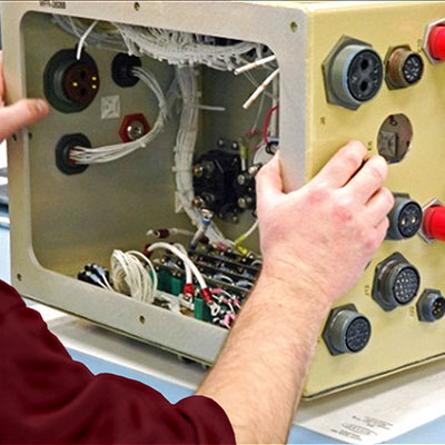 Worker working on electronic device