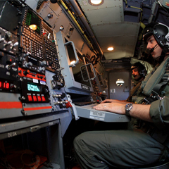 solider operating electronic device