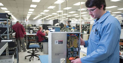 Worker working on electronic device