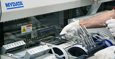 Worker working on electronic device