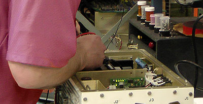 Worker working on electronic device